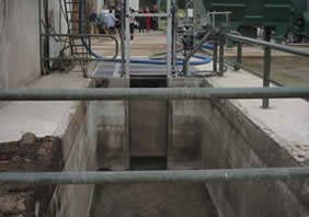 Back view of simple mixing and oading pit